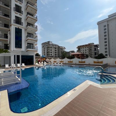 LUXUSMÖBLIERTE 1+1-Wohnung zum Verkauf in Mahmutlar Volantis Tower 13